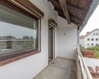 Mit Balkon