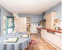 Küche mit Terrassenzugang