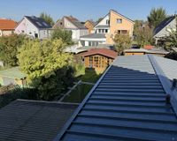 Seitlicher Anbau und Garten